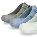 Kids Clog jelly shoes style in solid colors with buckles design.