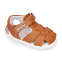 BLANDITOS kids sandal shoes laceless with crossed straps in nappa leather in tan color.