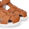 BLANDITOS kids sandal shoes laceless with crossed straps in nappa leather in tan color.