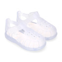 Classic style jelly shoes for the Beach and Pool with VELCRO strap closure.