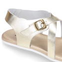 Metal finish leather sandal with anatomical white soles.