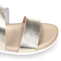 Metal finish leather sandal with anatomical white soles.