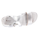 Metal finish leather sandal with anatomical white soles.