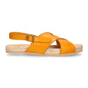 Leather sandal shoes espadrille style with crossed straps.