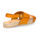 Leather sandal shoes espadrille style with crossed straps.