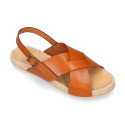 Leather sandal shoes espadrille style with crossed straps.