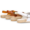 Leather sandal shoes espadrille style with crossed straps.