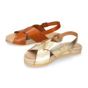 Leather sandal shoes espadrille style with crossed straps.