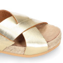 Leather sandal shoes espadrille style with crossed straps.