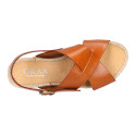 Leather sandal shoes espadrille style with crossed straps.