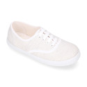 Cotton stripe canvas bamba type shoes with shoelaces.