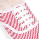 Cotton stripe canvas bamba type shoes with shoelaces.