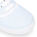 Cotton stripe canvas bamba type shoes with shoelaces.