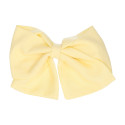 Bow for girl's hair in spring-summer colored fabric with clip.