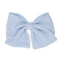 Bow for girl's hair in spring-summer colored fabric with clip.