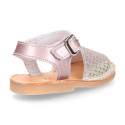 New Menorquina sandals in satin leather with shiny effects.