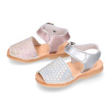 New Menorquina sandals in satin leather with shiny effects.