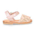 Soft leather Menorquina sandal shoes with pearl effect and laces design.