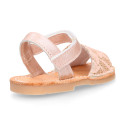Soft leather Menorquina sandal shoes with pearl effect and laces design.