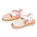 Soft leather Menorquina sandal shoes with pearl effect and laces design.