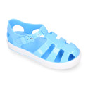 Jelly shoes tennis style design in solid colors.