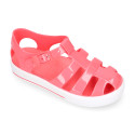 Jelly shoes tennis style design in solid colors.