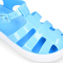 Jelly shoes tennis style design in solid colors.