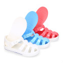 Jelly shoes tennis style design in solid colors.