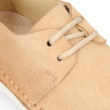 New spring summer laces up shoes in suede leather with flexible soles.