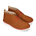 Classic Safari boots in nubuck leather and white soles.