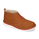 Classic Safari boots in nubuck leather and white soles.