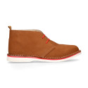 Classic Safari boots in nubuck leather and white soles.