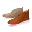 Classic Safari boots in nubuck leather and white soles.