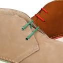 Classic Safari boots in nubuck leather and white soles.