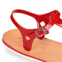 New T-strap sandal shoes with jelly design to dress.