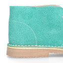 Classic Suede leather safari boots in spring colors.
