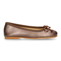 New Ballet flats in matte metal leather with adjustable ribbon.