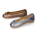 New Ballet flats in matte metal leather with adjustable ribbon.