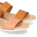 Leather sandal shoes with anatomical white soles.