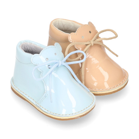 Little bear safari boots in soft colors patent leather.