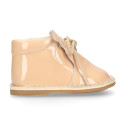 Little bear safari boots in soft colors patent leather.