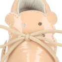 Little bear safari boots in soft colors patent leather.