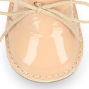 Little bear safari boots in soft colors patent leather.