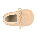 Little bear safari boots in soft colors patent leather.