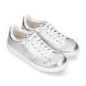 Casual tennis shoes in metal nappa leather with shoelaces.