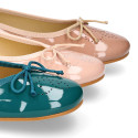 Classic Ballet flats in patent leather with english design.