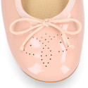 Classic Ballet flats in patent leather with english design.