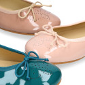 Classic Ballet flats in patent leather with english design.