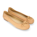 New suede leather Ballet flats with crossed ribbons.