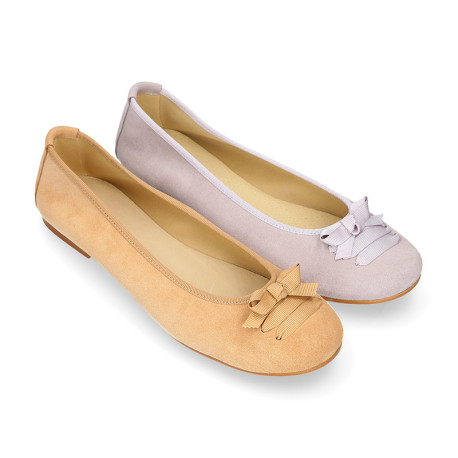 New suede leather Ballet flats with crossed ribbons.